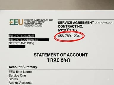 A paper EEU bill with the contract number circled in its header block